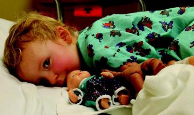 Child in hospital bed